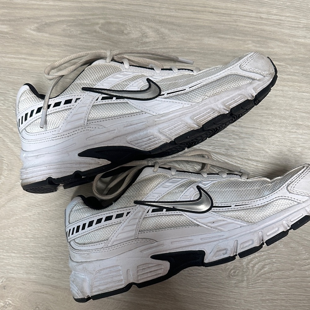 Nike women’s White and Black Athletic Sneakers